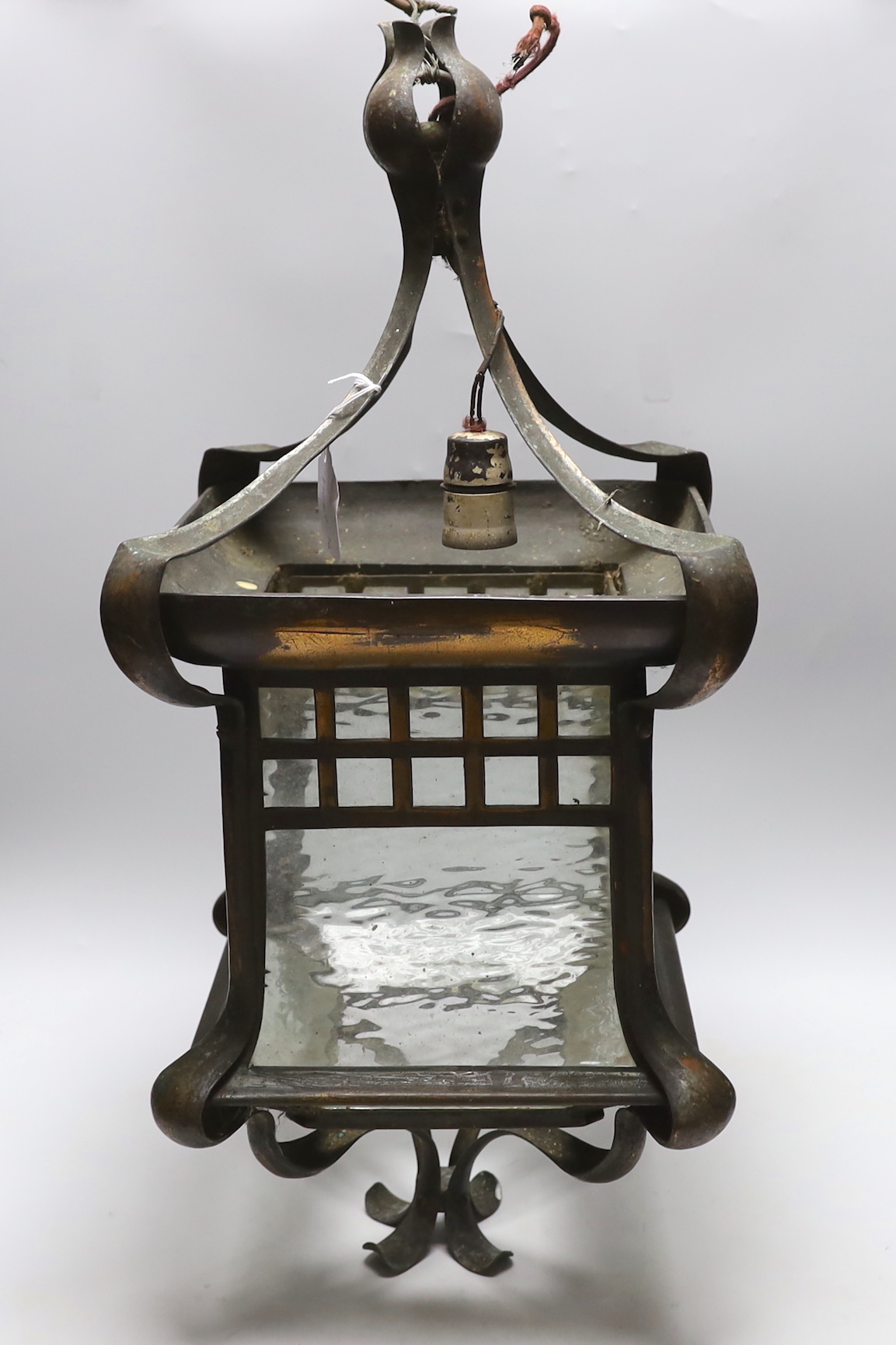 An Art Nouveau copper and glass lantern